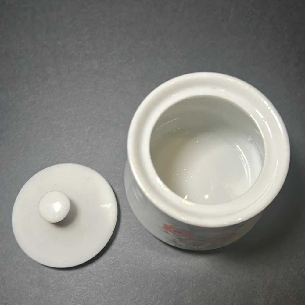 Vintage white porcelain cream‎ and sugar with floral design